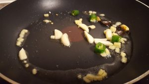 fry ginger chilli and garlic in methi mattar malai recipe