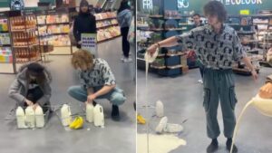 Animal Rebellion protestors pour milk onto floor inside Manchester M&S