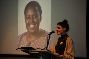 Nadia speaking at event