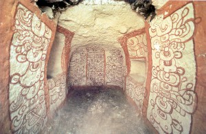Looted tomb at Rio Azul from National Geographic The mask is thought to come from this looted tomb (from National Geographic)