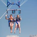 two-happy-girls-parasailing