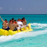 setting-off-on-the-banana-towed-by-boat