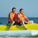 two-men-riding-the-banana