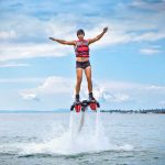 beginner-flyboarding-above-blue-ocean