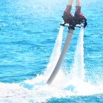 close-up-of-flyboarders-feet-with-red-buoy
