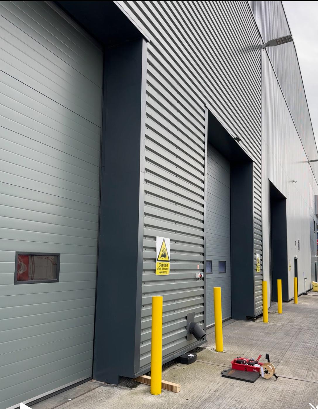 Apex Pest Control technician installing tamper-resistant rodent bait station on commercial premises in Yorkshire