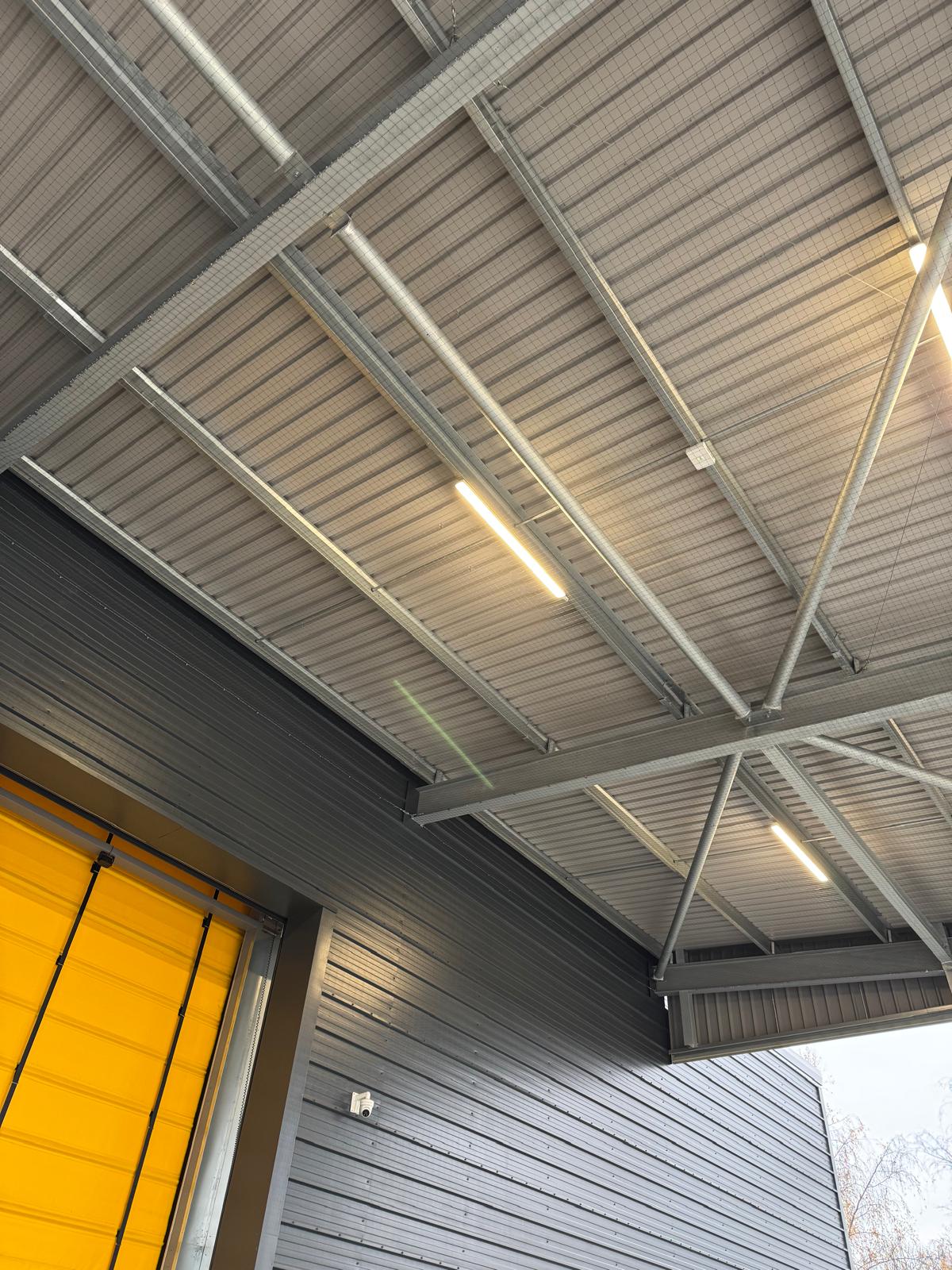 Commercial loading bay roof canopy bird proofing installation by Apex Pest Control South Yorkshire