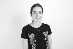 A black and white image showing Bluestep Solutions employee Mia Bates
