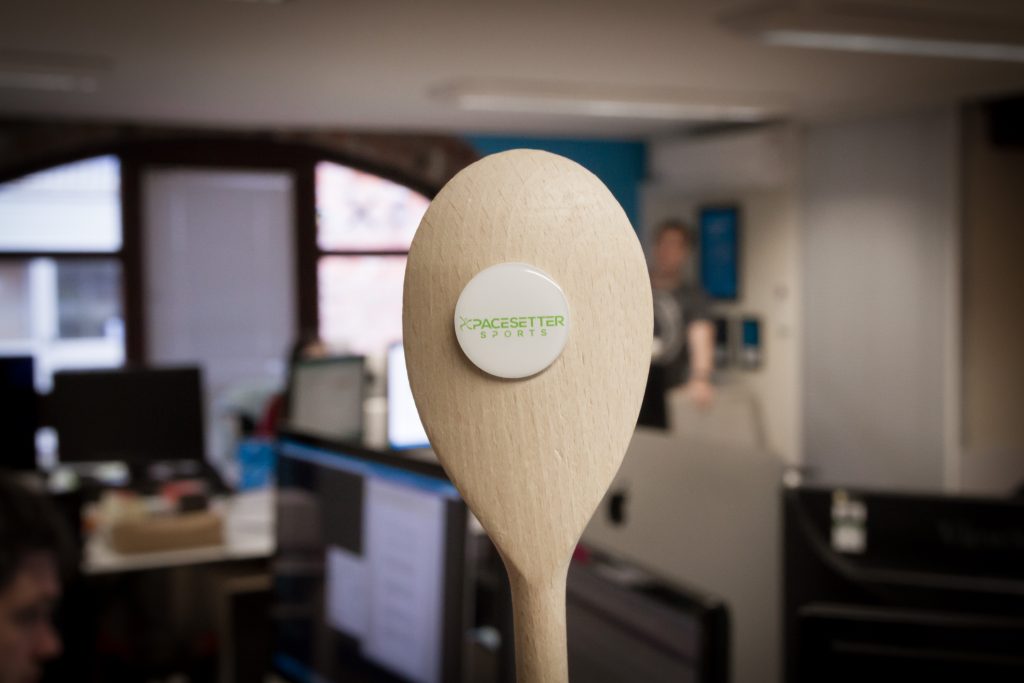 An image showing a wooden spoon with the Pacesetters logo on it