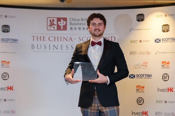Liam Howel, Deputy Head of Retailer Marketing for BYD UK, receiving the award