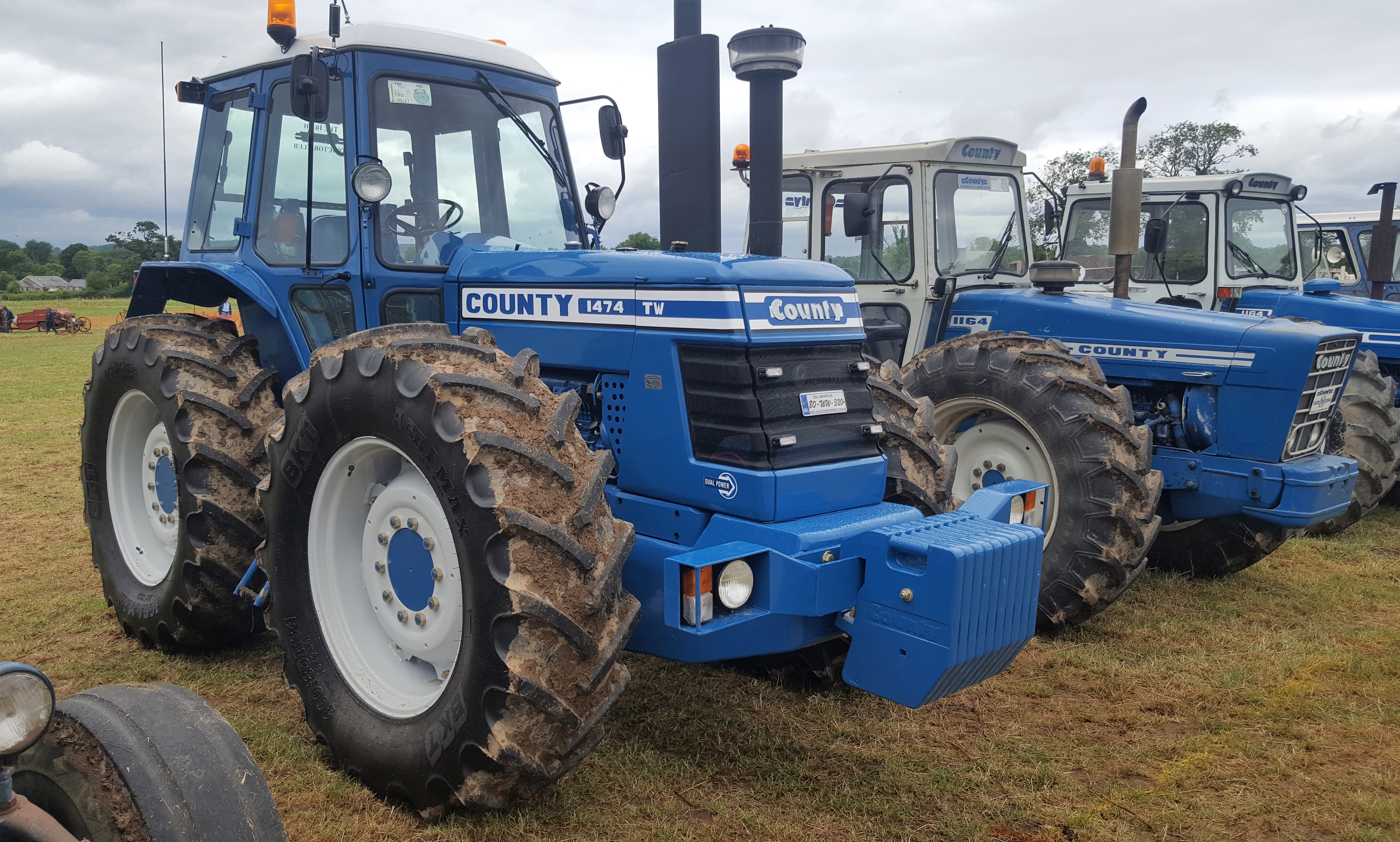 99 County tractors cluster together in one field The Farming Forum