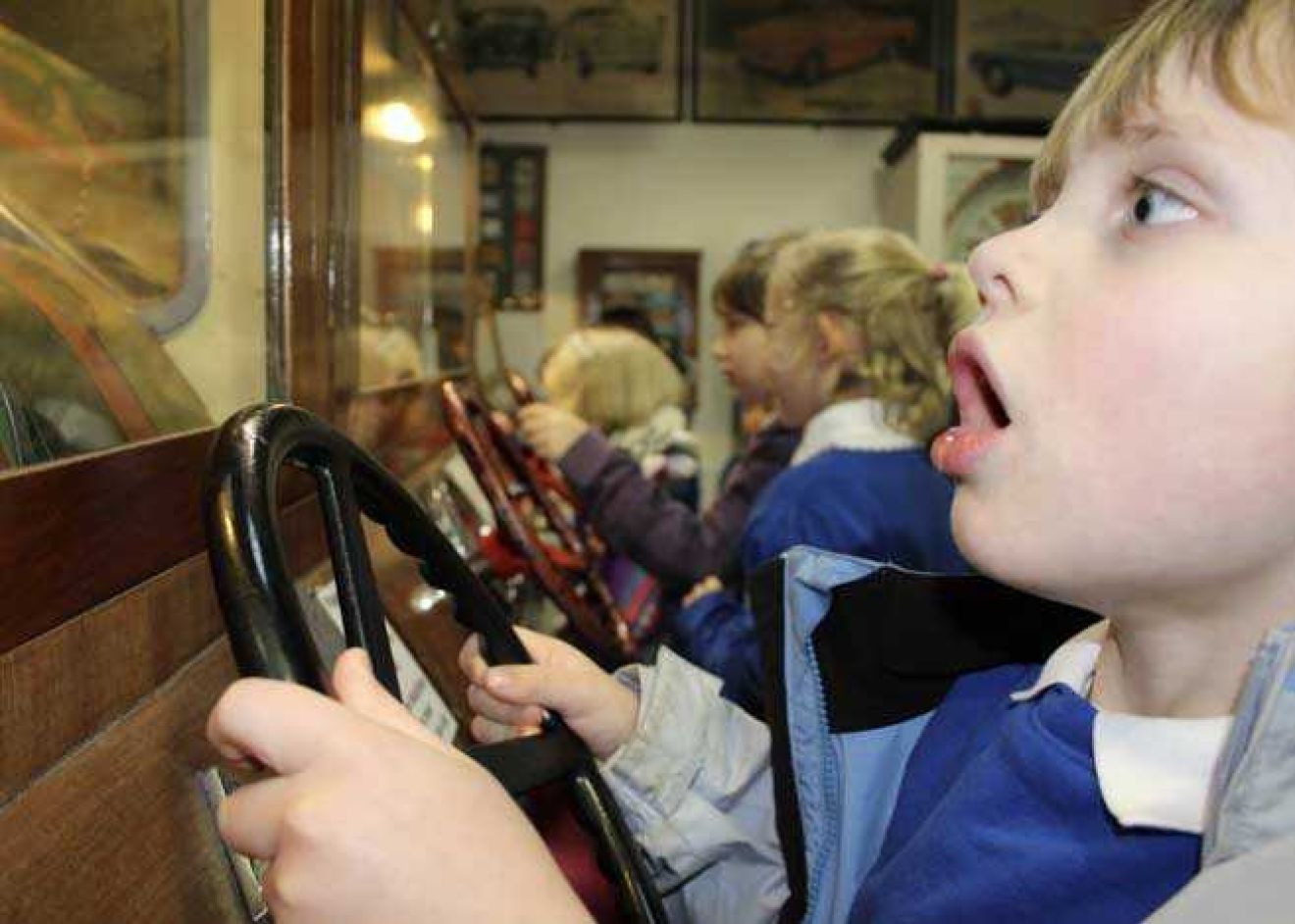 Children playing on the antiqu slot machines on the 1st floor