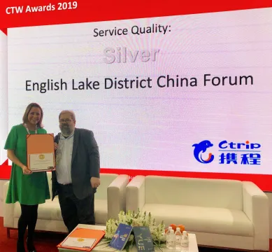 Jennifer accepting award