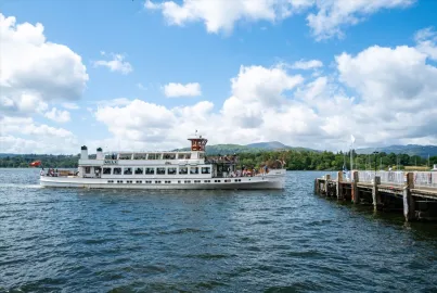 Steamer MV Swan arriving at Ambleside (Waterhead) Pier on the Red Cruise