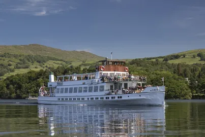 Traditional steamer MV Swan on the Red Cruise departing Ambleside (Waterhead) Pier.