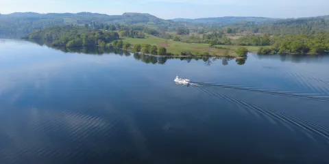 Our modern launch going past Wray estate