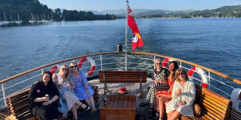 Friends enjoying the evening buffet cruise