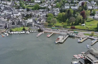 Look out for the red-hooded boats in Bowness Bay