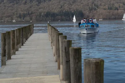 One of our modern launches arriving at Windermere Jetty Museum