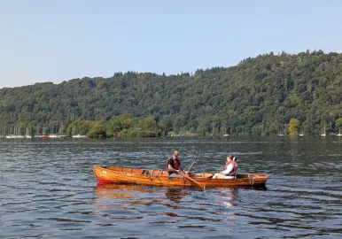 Enjoy a rowing boat on a beautiful sunny day on Lake Windermere