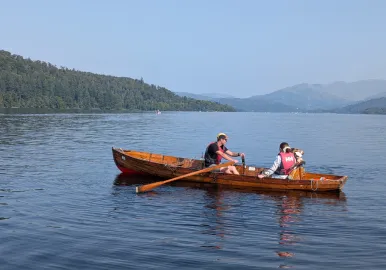 Enjoy a rowing boat on a beautiful sunny day on Lake Windermere