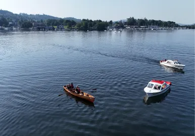 Enjoy a rowing boat on a beautiful sunny day on Lake Windermere