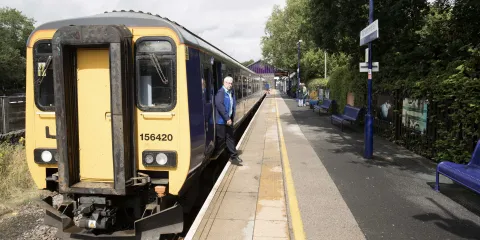 A train arriving at Windermere Station on The Lakes Line