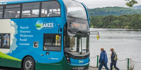 The bus waiting for passengers next to Lake Windermere