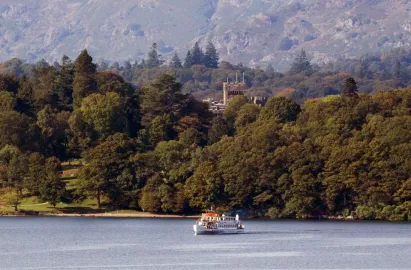 On the Red Cruise passing Wray Castle on the Western shore.