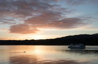 Miss Cumbria heading into sunset from Amblesde Waterhead