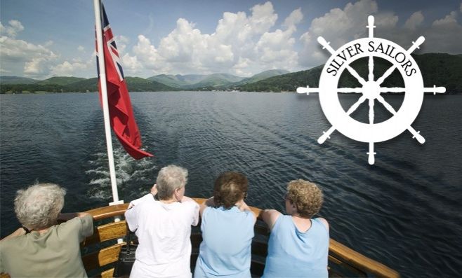 Four pensioners on the back of a cruise with the silver sailors logo