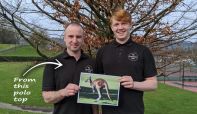Two Windermere Lake Cruises staff in polo tops that were donated to help orphan kangaroos