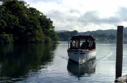 Cross Lake Shuttle approaching the western shore