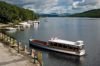 Fell Foot Ferry arriving at Lakeside Pier near lakeside Hotel and Spa
