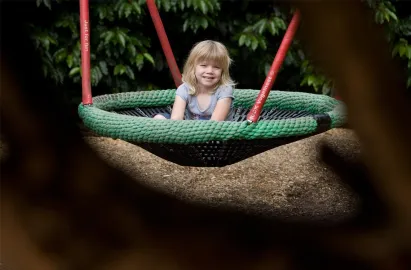 A girl enjoying the plygrounds at Fell Foot