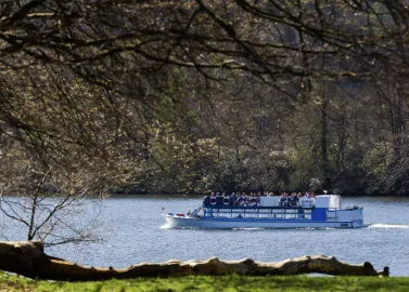 One of our modern launches cruising past Cockshott Point