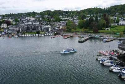 Modern launch coming in to Bowness bay