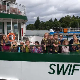 Group of children on board the MV Swift