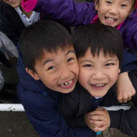 Children waiting to board one of the vessels