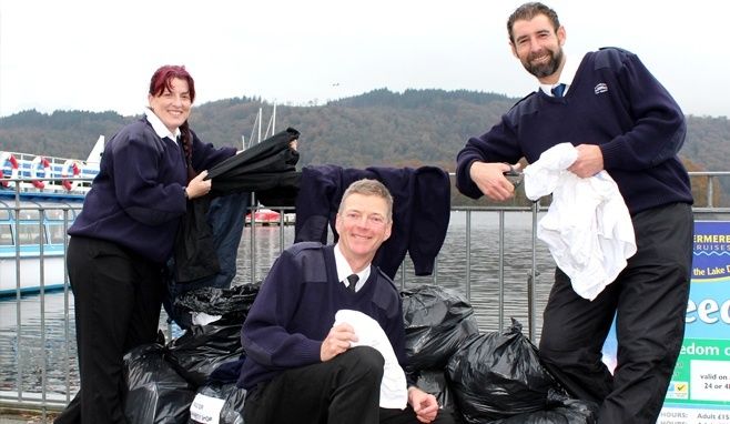 3 Windermere Lake Cruises staff give out clothing