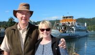 A couple about to board a steamer from Bowness Pier as part of the Silver Sailor Scheme.