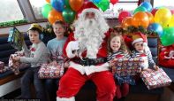 Father Christmas and children on board a previous Santa Cruise from Windermere Lake Cruises