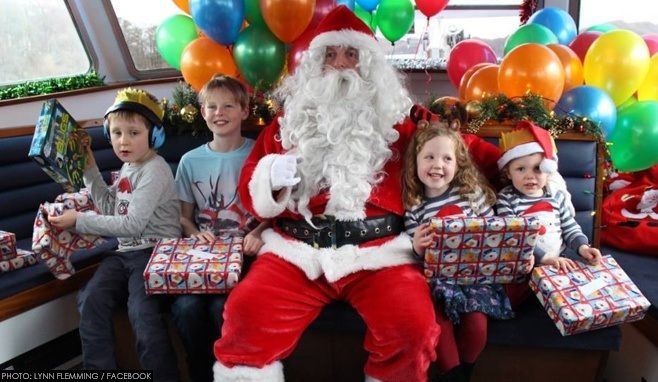 Father Christmas and children on board a previous Santa Cruise from Windermere Lake Cruises
