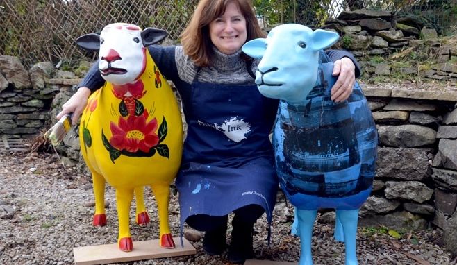 Colourful sheep sculptures set sail on Windermere