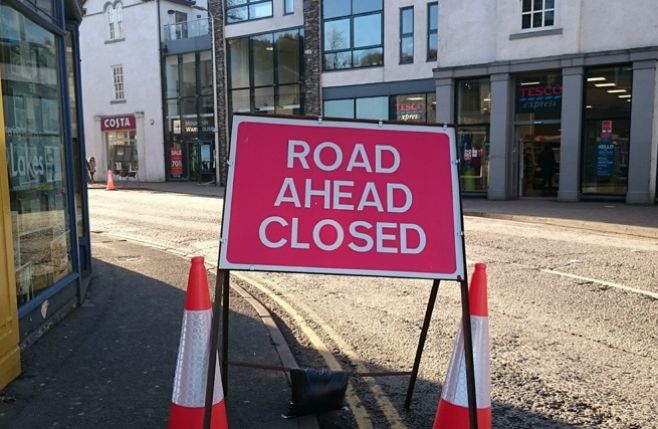 A sign in Bowness village indicating that the road ahead is closed.