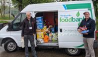 James Ventham from Windermere Lake Cruises helps unload the donations to the Morecambe Bay Foodbank