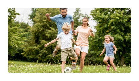 Family playing football
