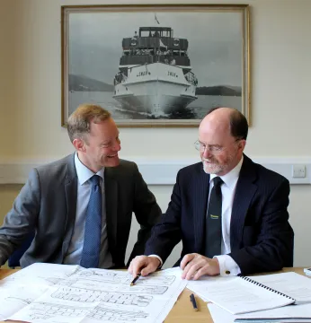 WLC Chairman Bill Bewley and Damen Sales Manager Arjen van Elk discussing plans