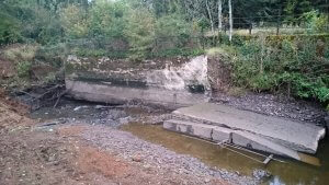 Condition of collapsed retaining wall following river diversion