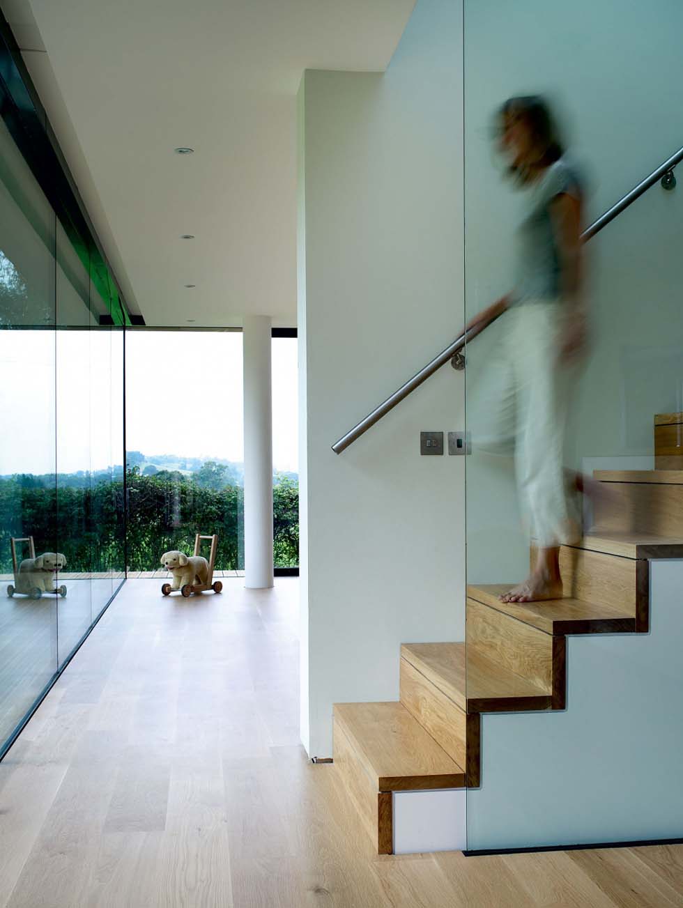 A modern staircase with glass panelling